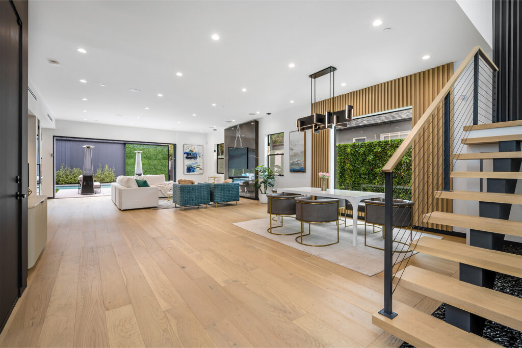 Wide plank hardwood flooring in a bright living room